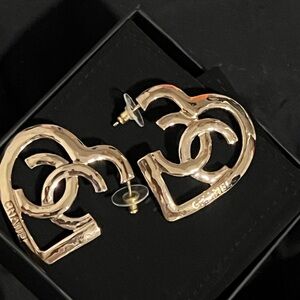 New Chanel hammered heart earrings, and champagne gold. Massive hearts